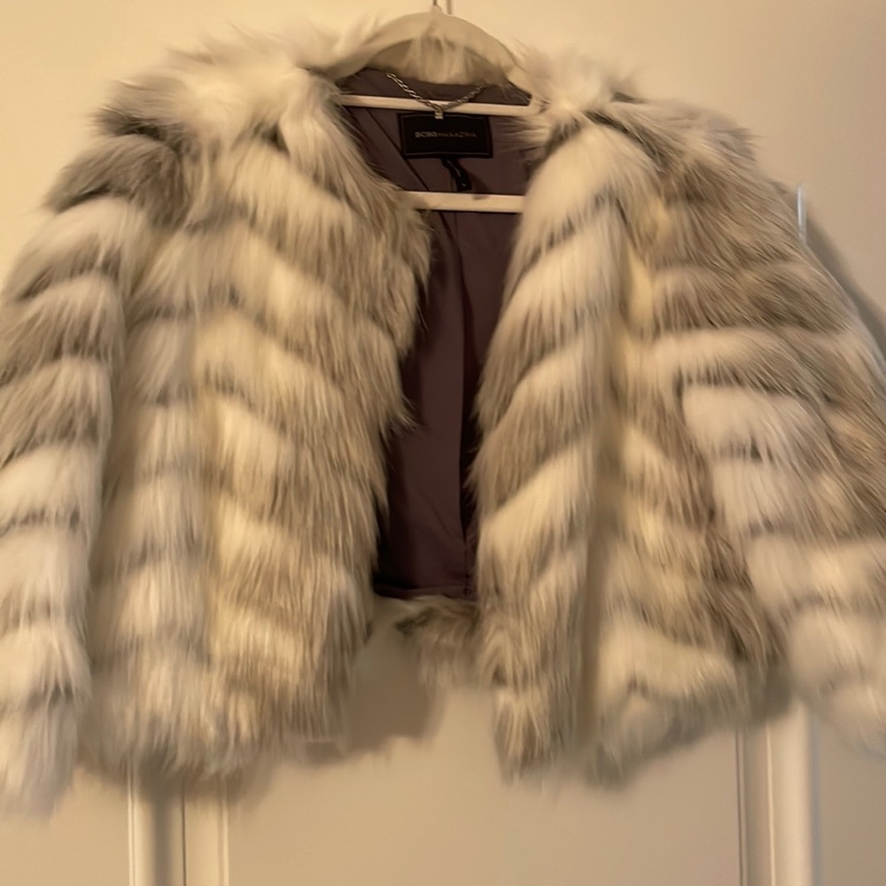 Excellent condition faux fur white and black coat